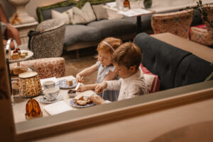 Tea children in Stanwell House The Orangery eating afternoon tea