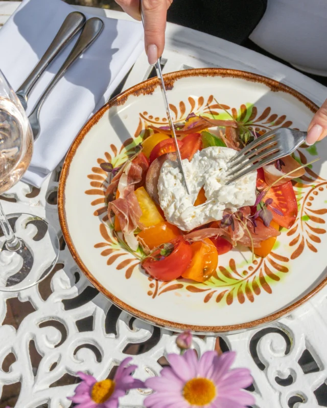 Fresh from The Garden menu… 

Creamy Burrata with Heritage Tomato Salad, Greek Salad with Seabass fillet and a Dark Chocolate Fondant served with homemade peanut butter ice cream.